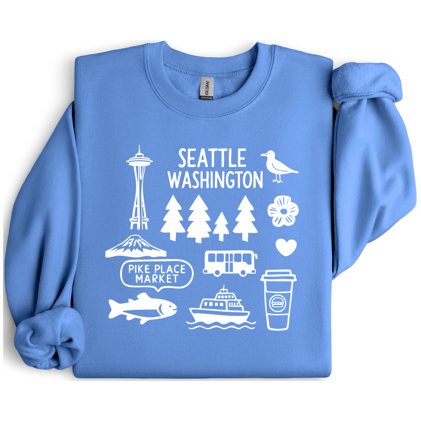 Carolina Blue sweatshirt with white Seattle-themed graphics on a white background