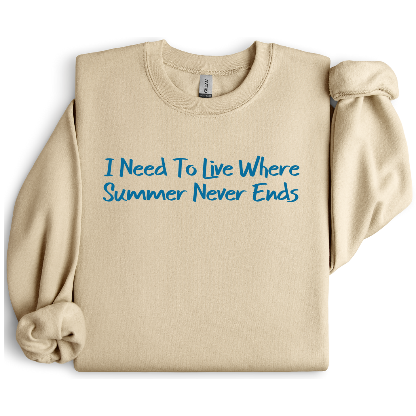 Gildan sweatshirt featuring blue text that reads “I Need To Live Where Summer Never Ends.” Cozy beach-inspired pullover for those who love the sun and ocean lifestyle. Made with a soft cotton-poly blend, ribbed cuffs, and double-needle stitching for durability. Perfect for coastal adventures, vacations, or casual summer-style outfits. Ideal gift for beach lovers and anyone who wishes for endless summer days.