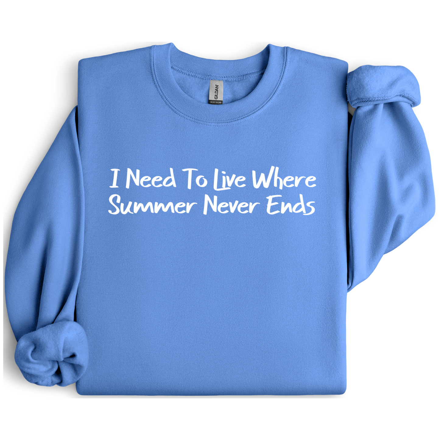 Gildan sweatshirt featuring blue text that reads “I Need To Live Where Summer Never Ends.” Cozy beach-inspired pullover for those who love the sun and ocean lifestyle. Made with a soft cotton-poly blend, ribbed cuffs, and double-needle stitching for durability. Perfect for coastal adventures, vacations, or casual summer-style outfits. Ideal gift for beach lovers and anyone who wishes for endless summer days.