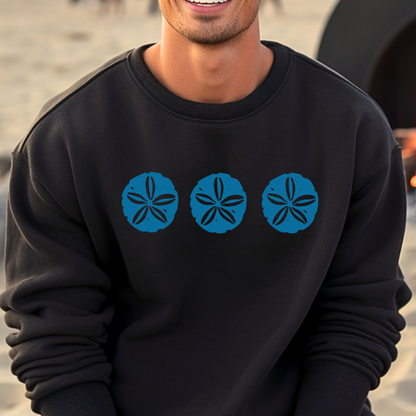 Gildan sweatshirt featuring three blue sand dollar graphics printed across the chest. Soft cotton-poly blend fabric with ribbed cuffs and waistband for a cozy, durable fit. Perfect for beach lovers and coastal style enthusiasts who appreciate simple ocean-inspired designs. Ideal for layering on cool seaside evenings or adding a subtle beach vibe to casual outfits.
