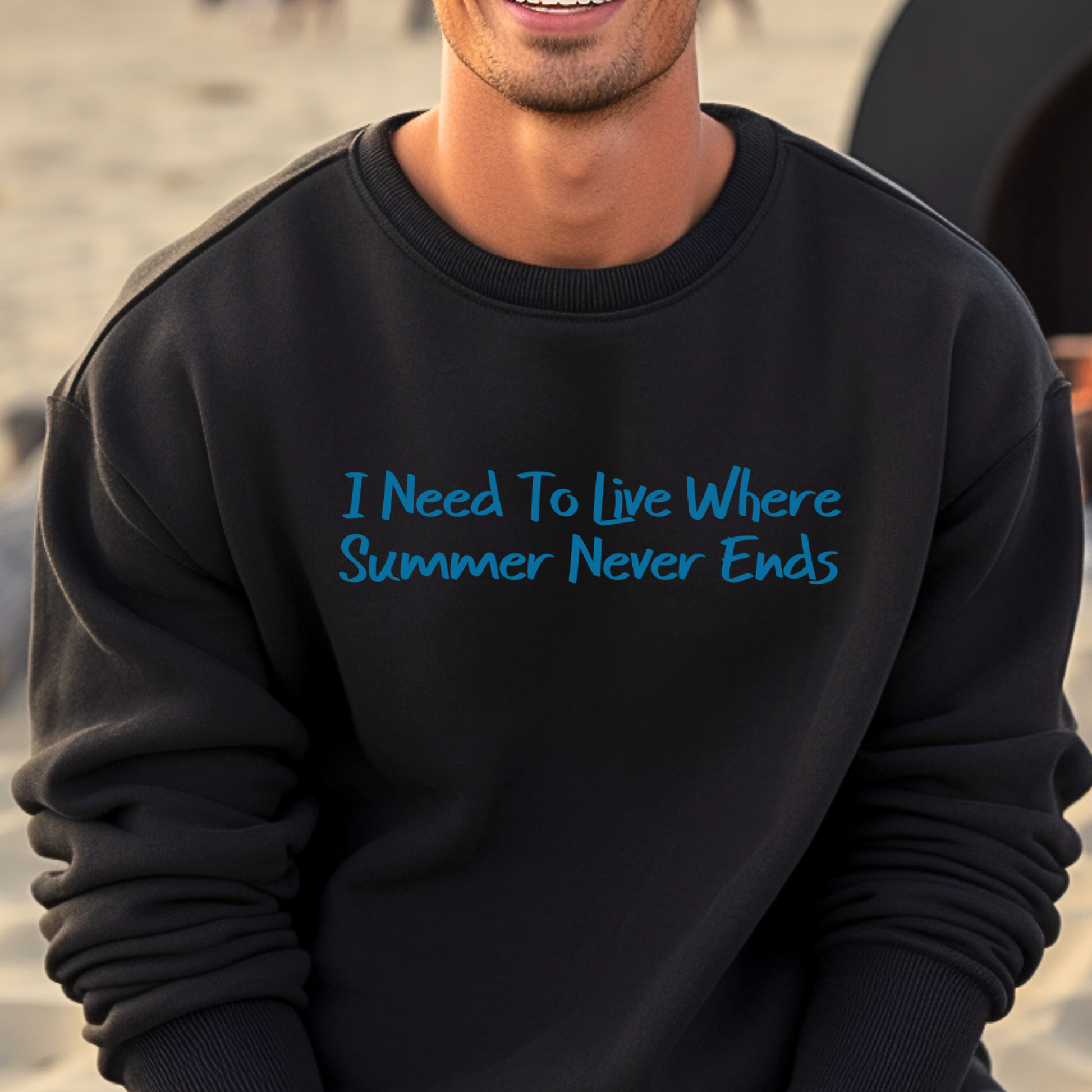 Gildan sweatshirt featuring blue text that reads “I Need To Live Where Summer Never Ends.” Cozy beach-inspired pullover for those who love the sun and ocean lifestyle. Made with a soft cotton-poly blend, ribbed cuffs, and double-needle stitching for durability. Perfect for coastal adventures, vacations, or casual summer-style outfits. Ideal gift for beach lovers and anyone who wishes for endless summer days.