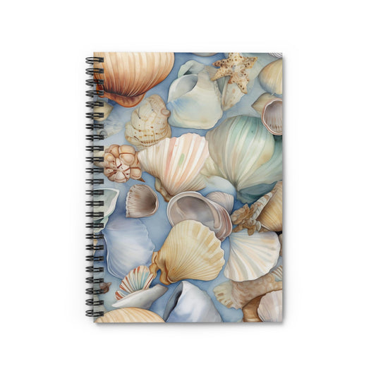 The Coastal Charm Spiral Notebook features a seashell design with vibrant scallop and conch shells on a pale blue background, ideal for journaling.