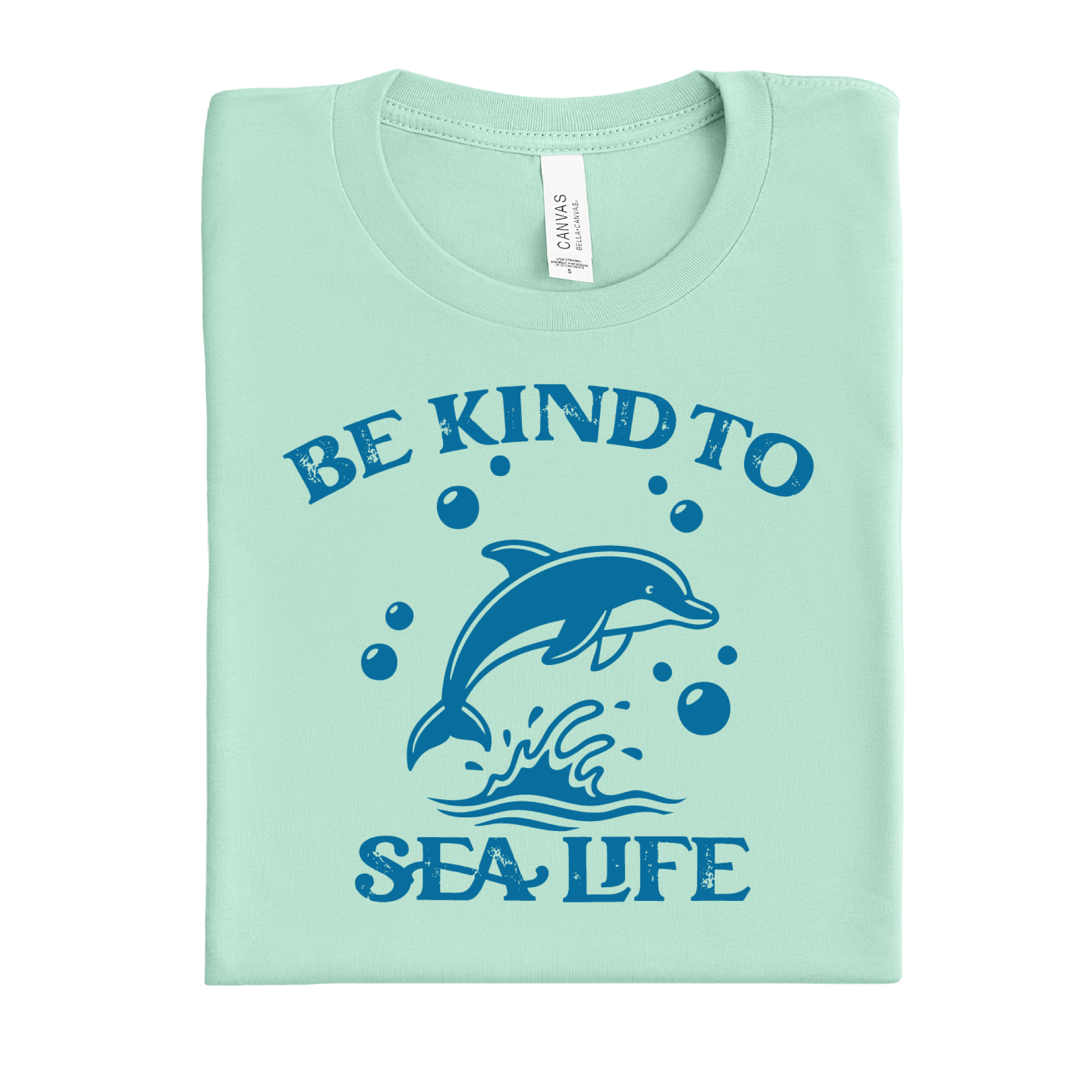 mint green t-shirt with a dolphin graphic and text 'Be Kind to Sea Life' on a white background