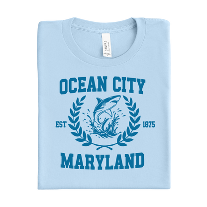 Baby blue t-shirt with 'Ocean City, Maryland' design featuring a shark and laurel leaves.