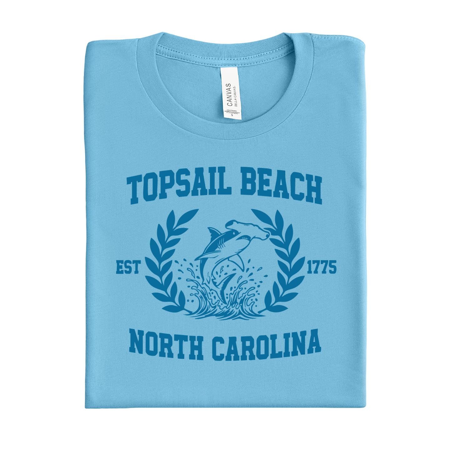 Folded ocean blue t-shirt with Topsail Beach, North Carolina design on a white background