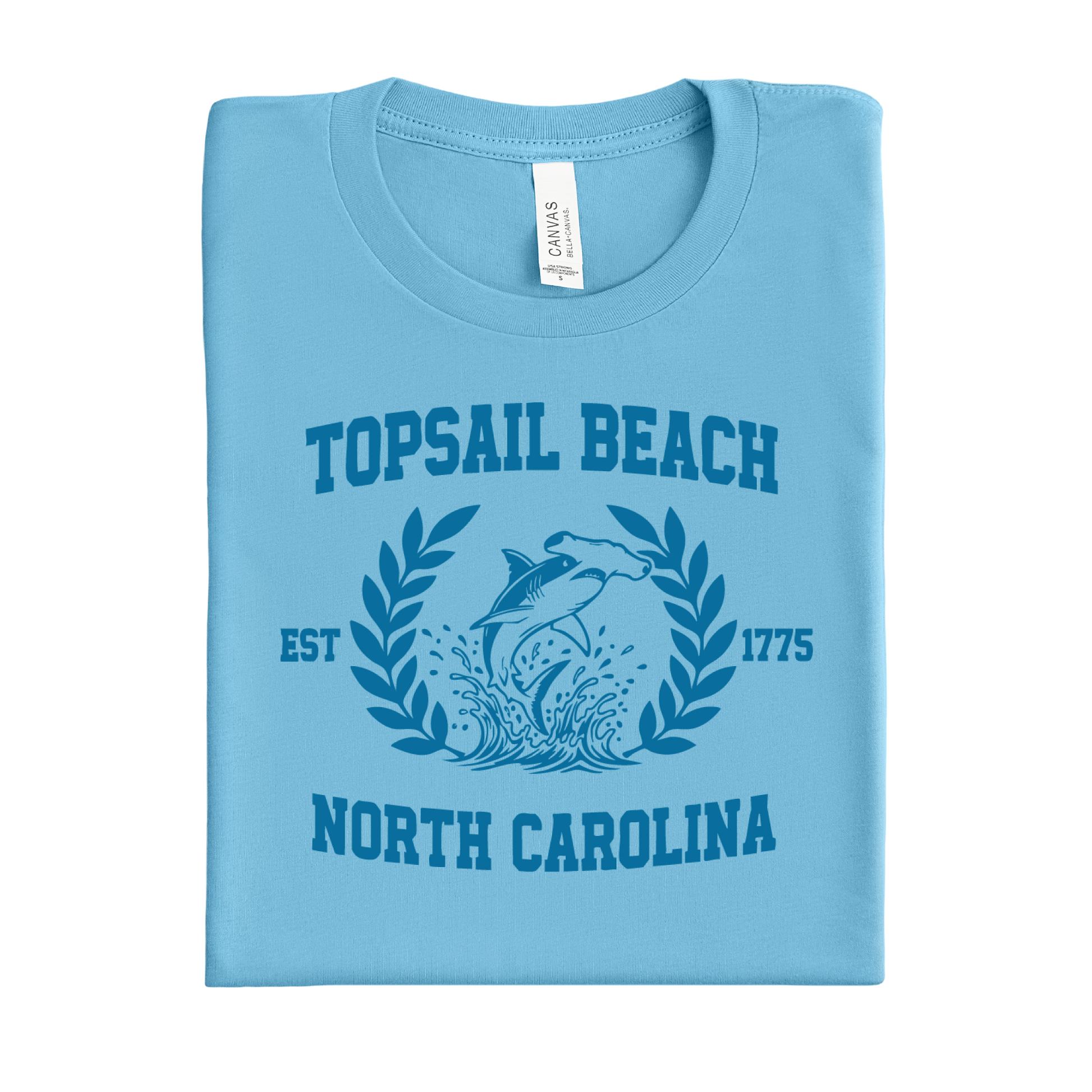 Folded ocean blue t-shirt with Topsail Beach, North Carolina design on a white background