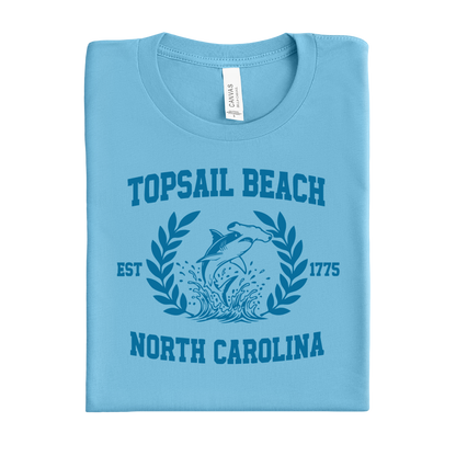 Folded ocean blue t-shirt with Topsail Beach, North Carolina design on a white background