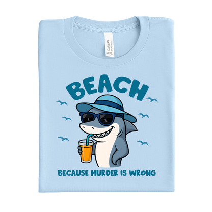 Baby blue t-shirt with a shark graphic and text on a white background
