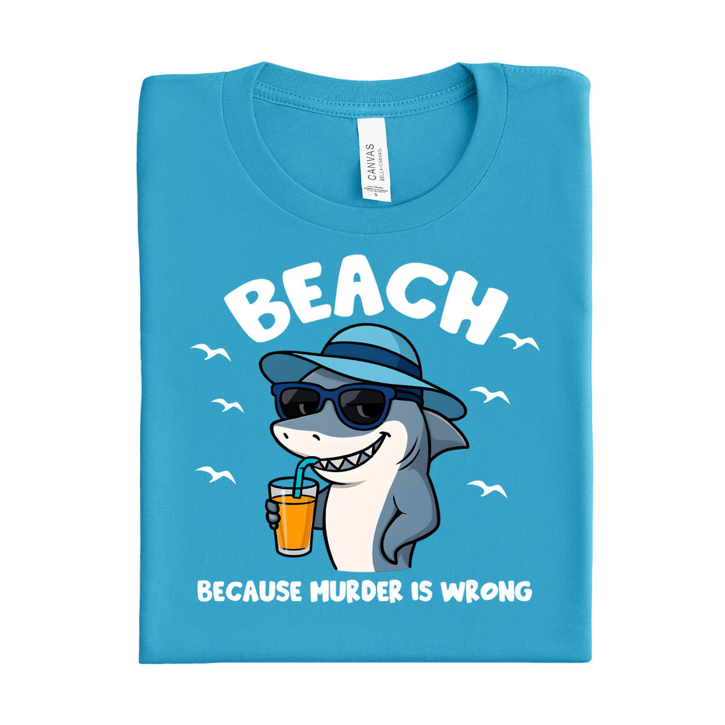 Folded aqua blue t-shirt with a shark graphic and text on a white background