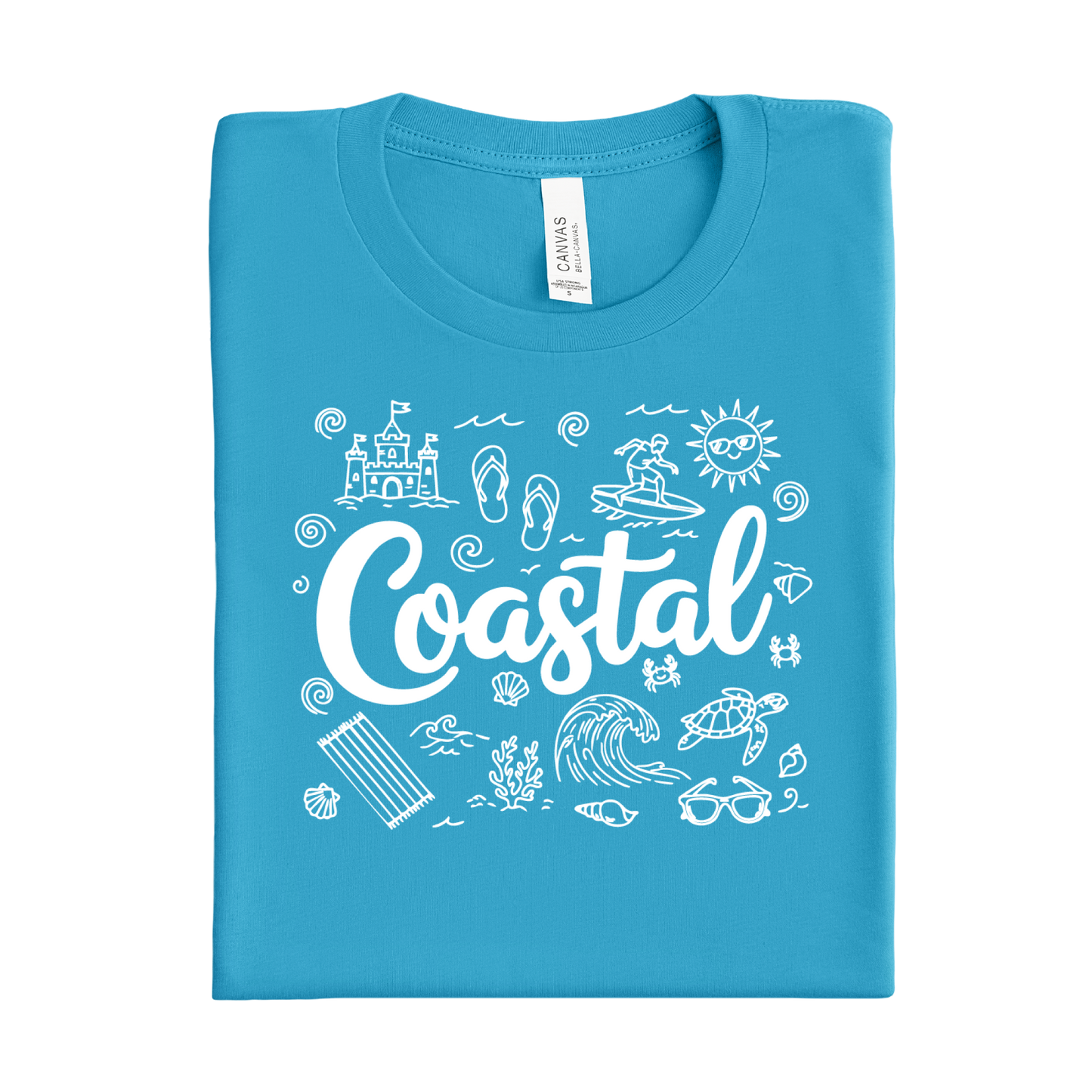 Folded aqua blue t-shirt with 'Coastal' design on a white background