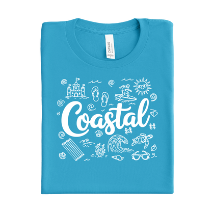 Folded aqua blue t-shirt with 'Coastal' design on a white background