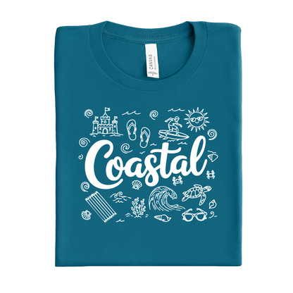 Folded deep teal t-shirt with 'Coastal' design on a white background
