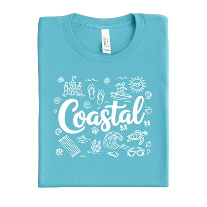 Folded turquoise t-shirt with 'Coastal' design on a white background