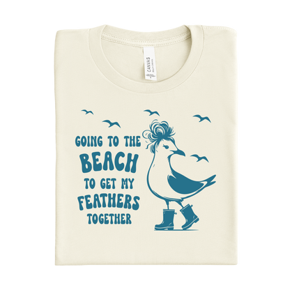 Natural t-shirt with blue seagull graphic and text on a white background