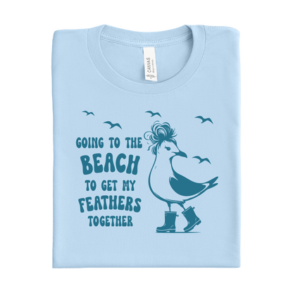 Baby blue t-shirt with a seagull graphic and text on a white background