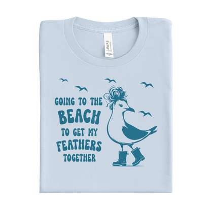 Light blue t-shirt with a seagull graphic and text on a white background