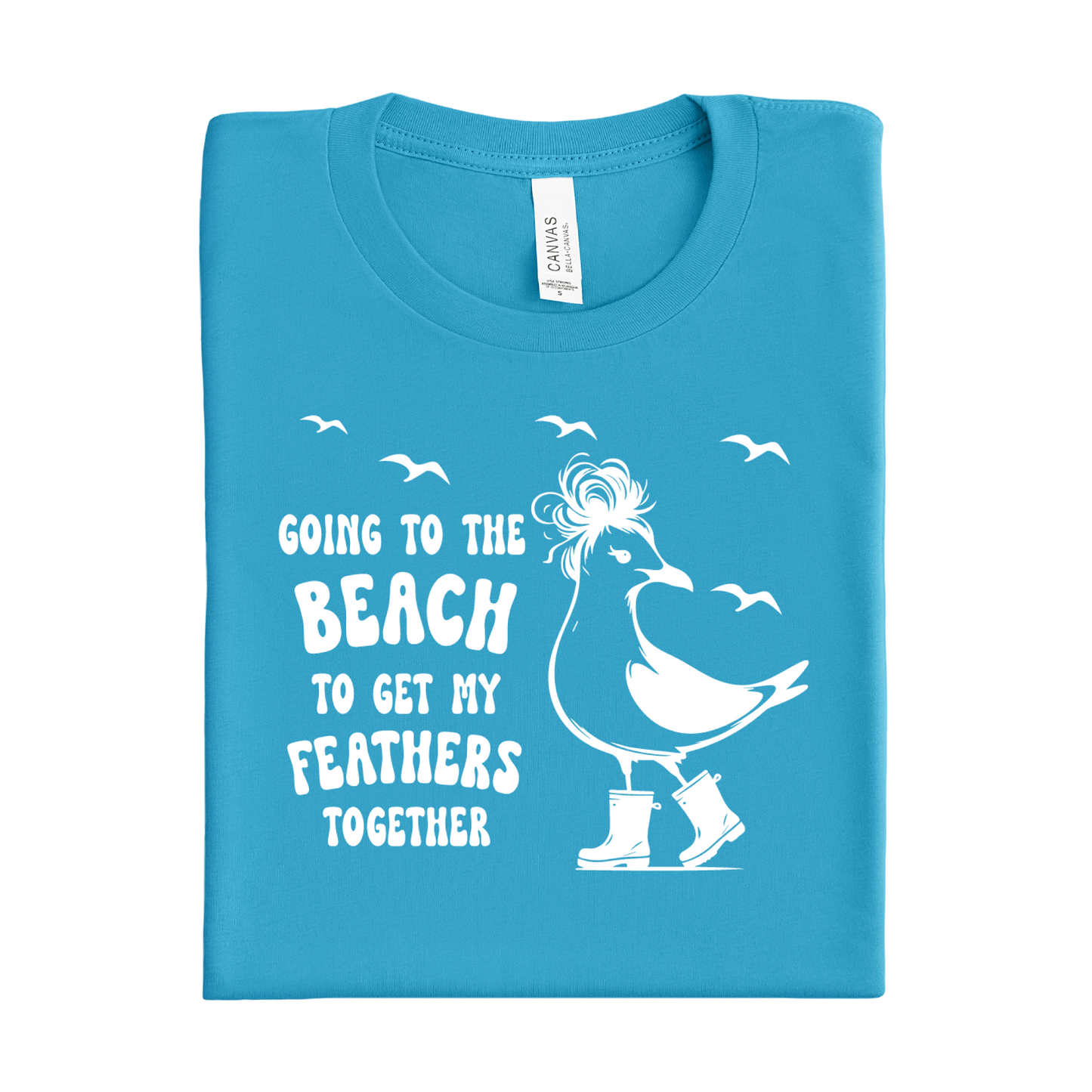 Folded aqua blue t-shirt with a white graphic and text on a white background