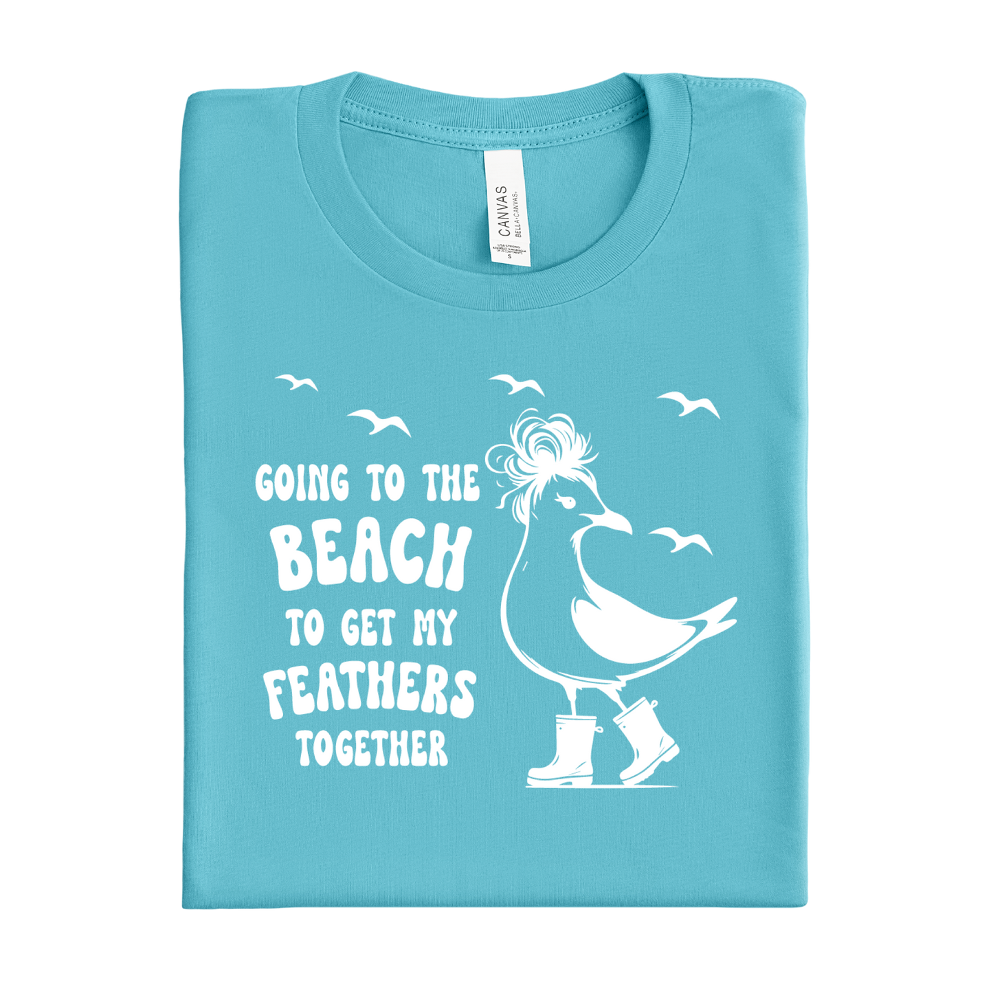 Folded Turquoise t-shirt with a white bird graphic and text on a white background