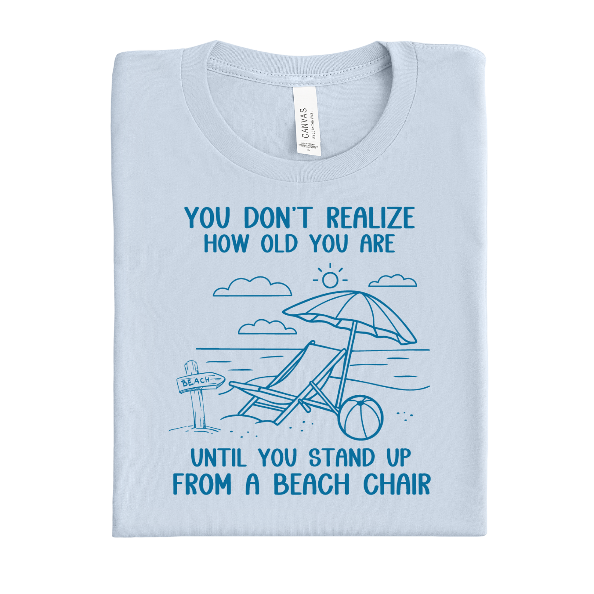 Light blue t-shirt with beach-themed design and text on a white background