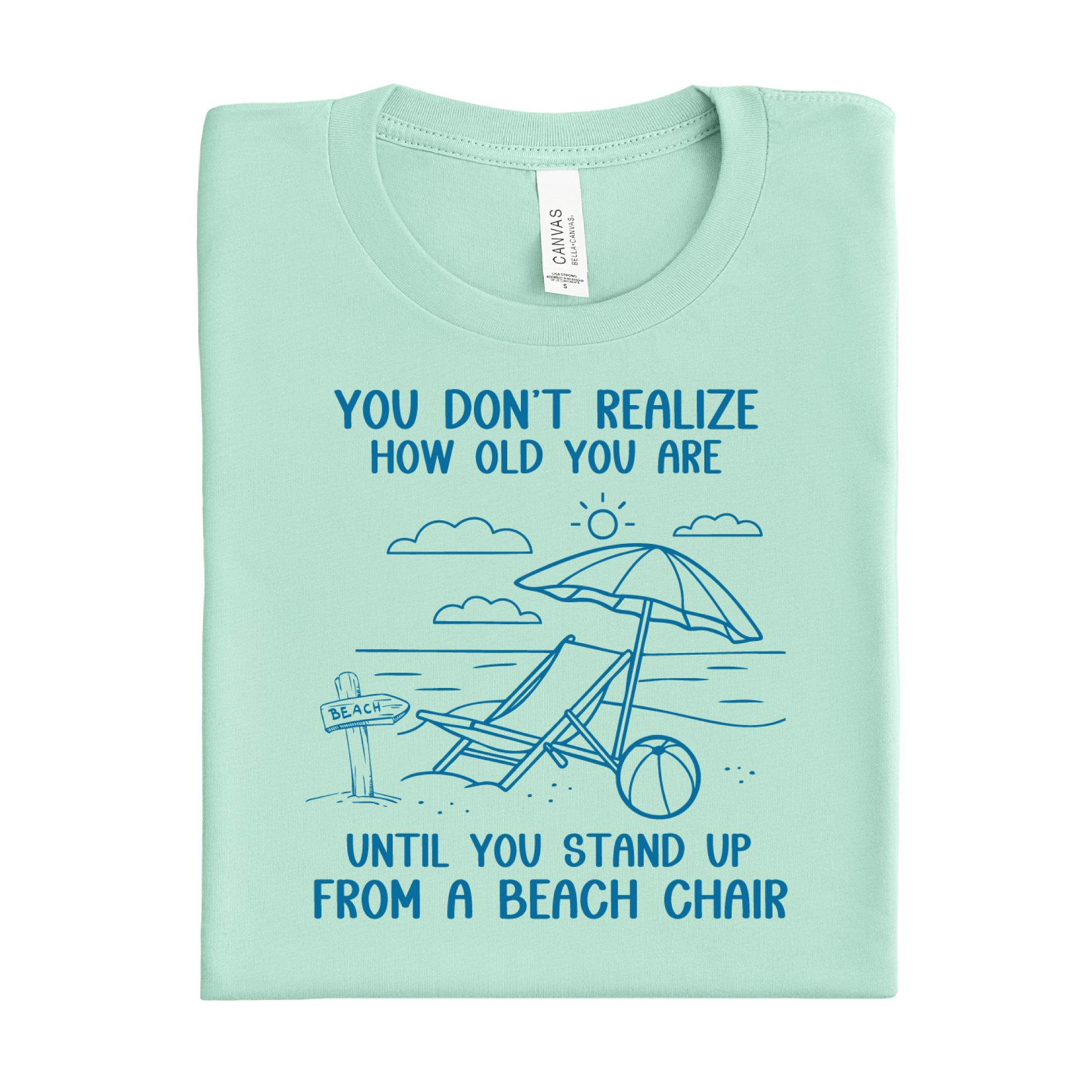 Mint green t-shirt with beach graphic and text on a white background