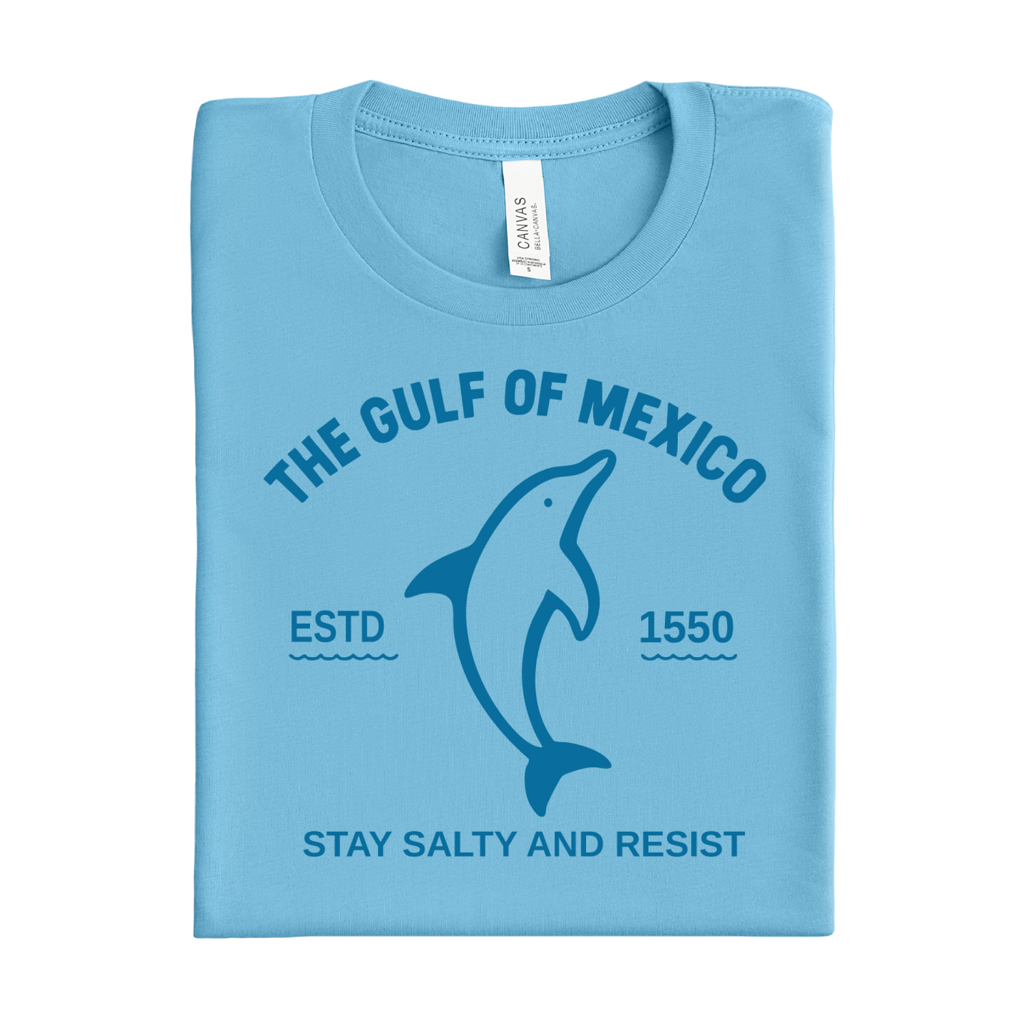 Folded ocean blue t-shirt with dolphin graphic and text on a white background