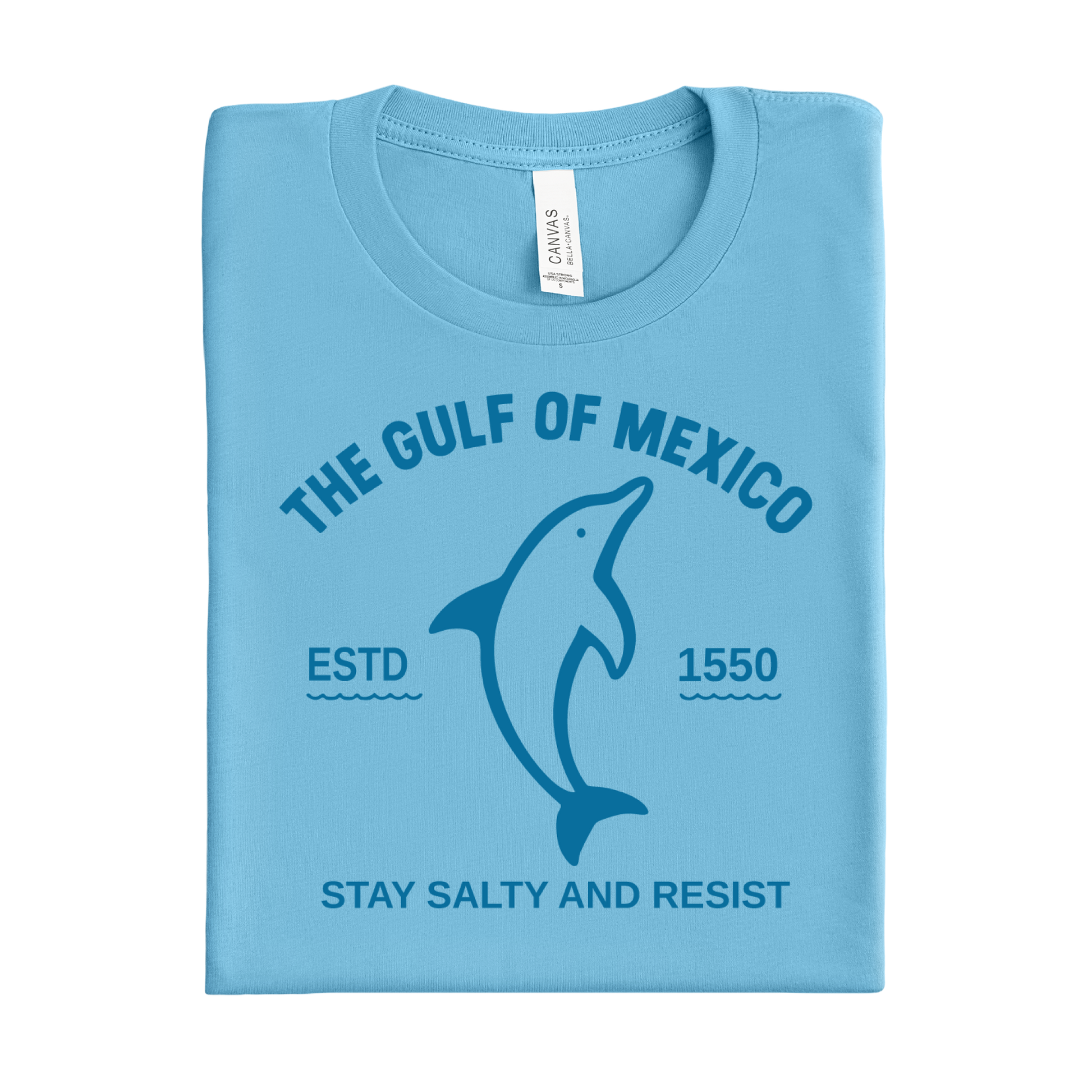 Folded ocean blue t-shirt with dolphin graphic and text on a white background