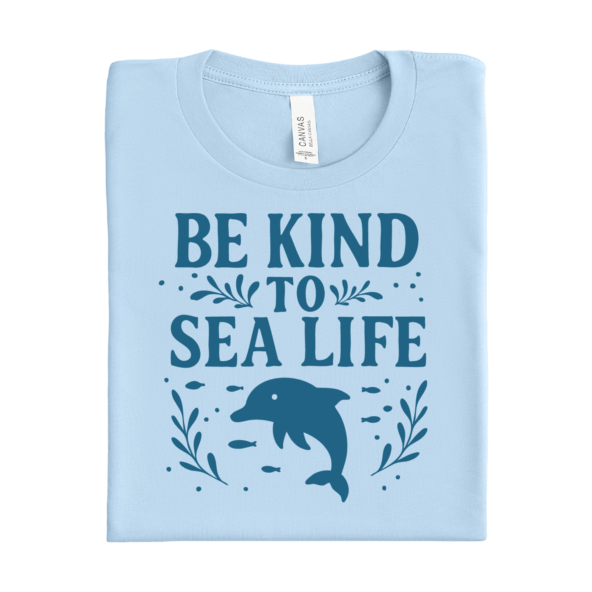 Baby blue t-shirt with 'Be Kind to Sea Life' text and dolphin graphic on a white background