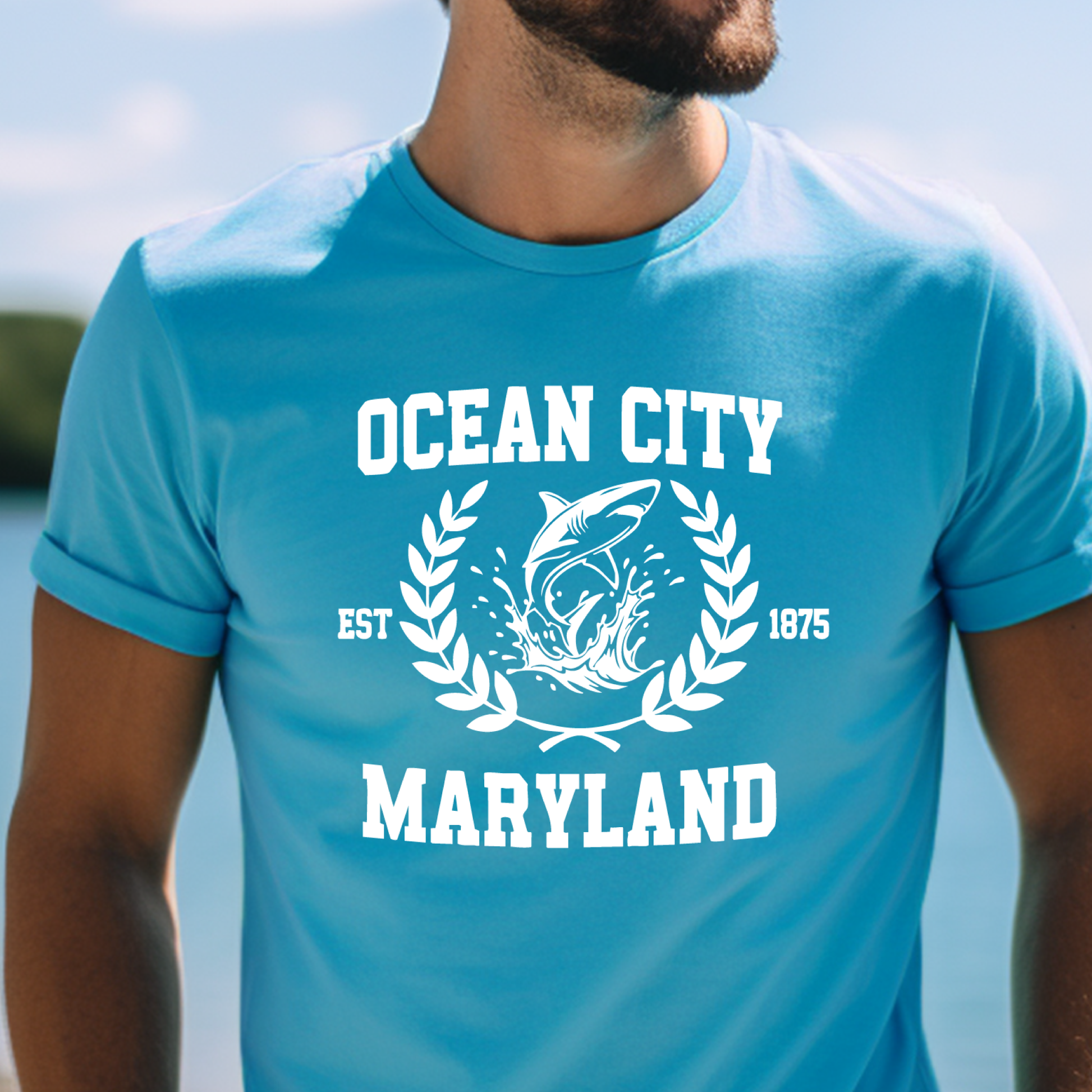 Aqua Blue t-shirt with 'Ocean City, Maryland' design featuring a fish and laurel wreath.
