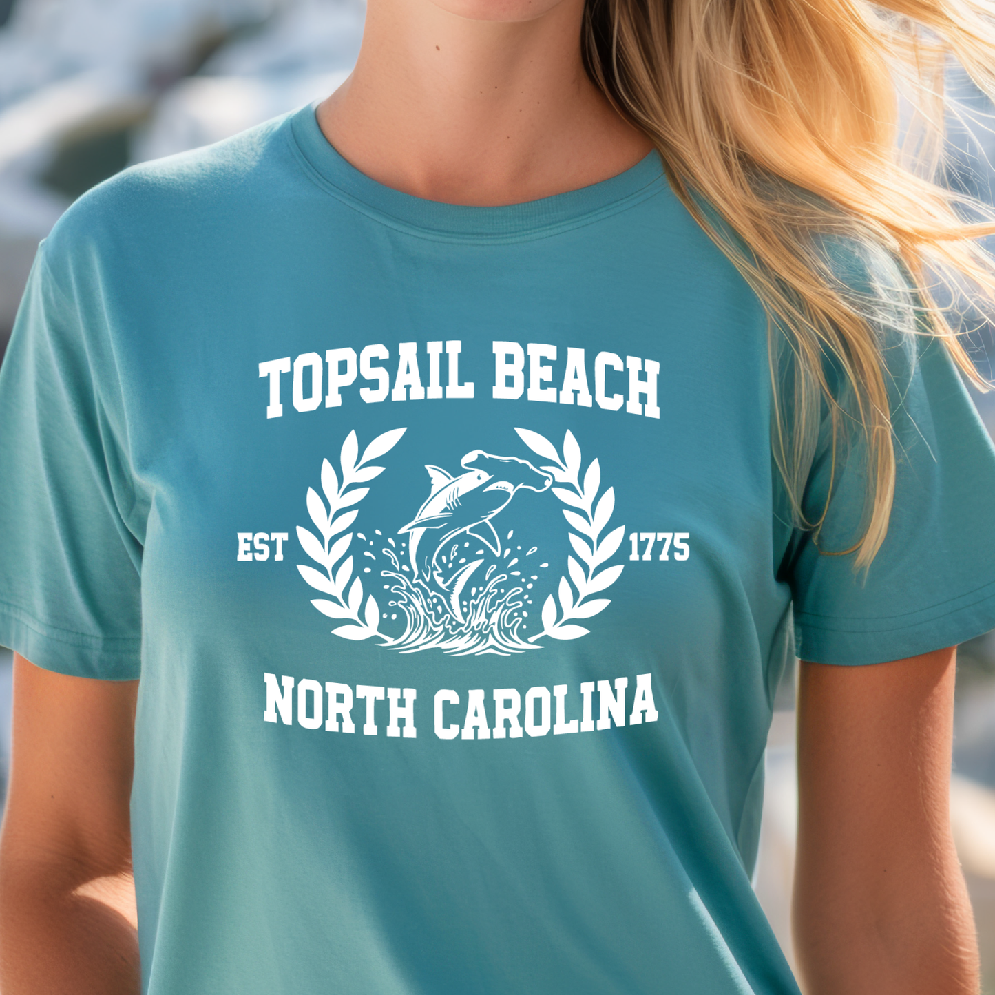 turquoise t-shirt with 'Topsail Beach, North Carolina' design featuring a dolphin.