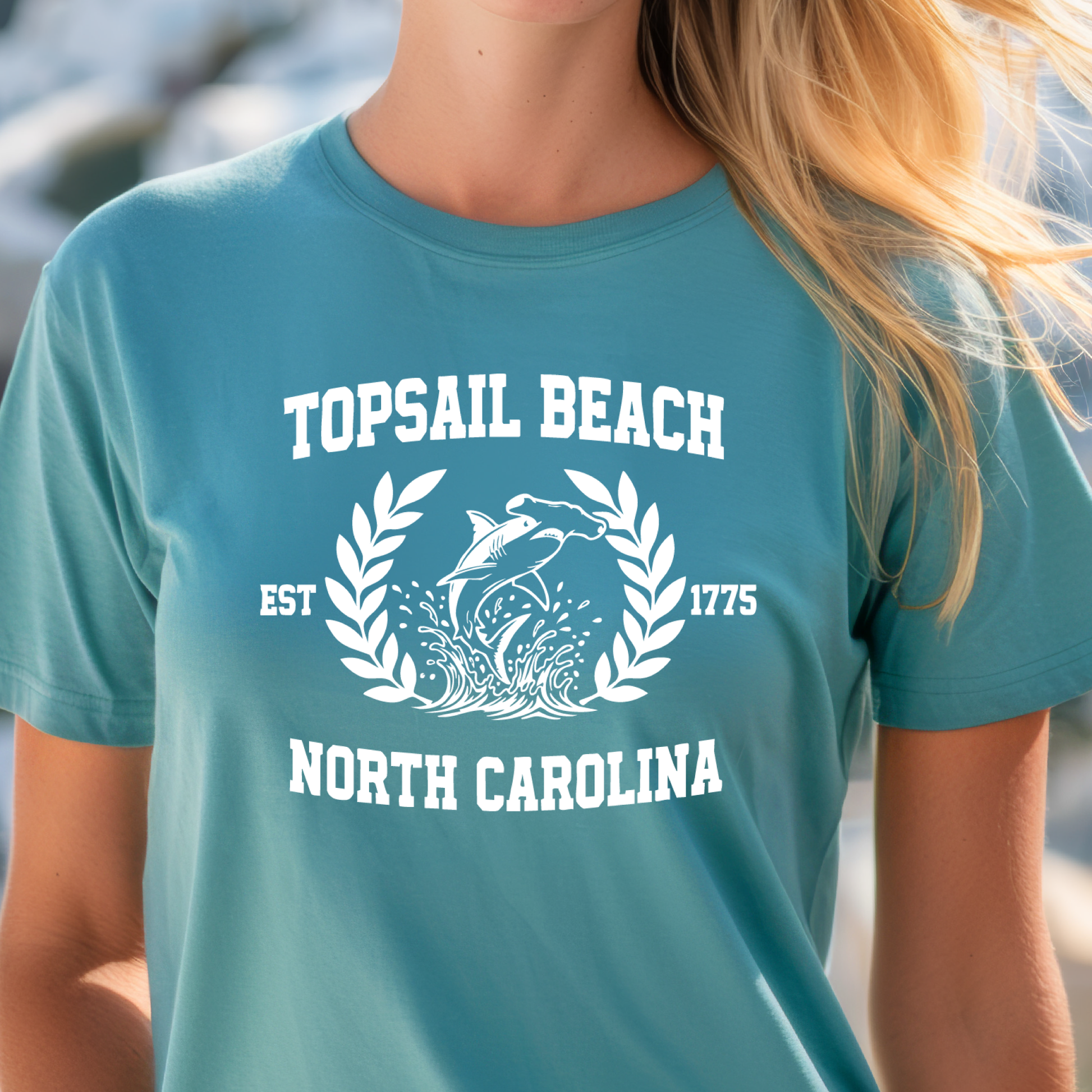 turquoise t-shirt with 'Topsail Beach, North Carolina' design featuring a dolphin.
