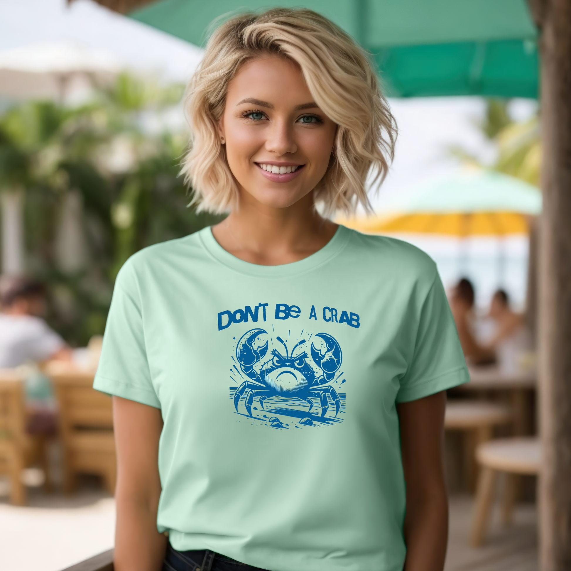 Bella Canvas 3001 "Don't Be A Crab" t shirt with cute angry crab in one color graphic. Picture of a girl standing in a beach bar wearing a t shirt.