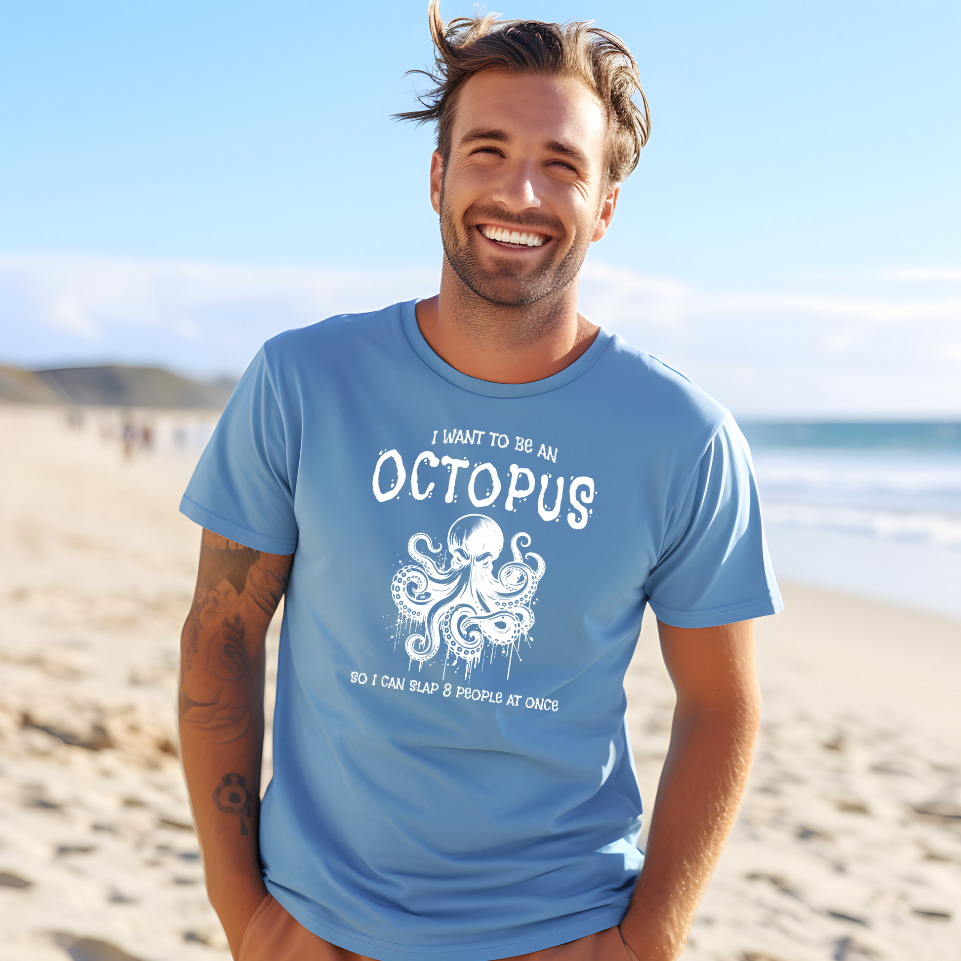 Bella Canvas 3001 "I Want To Be An Octopus So I Can Slap 8 People At Once" t shirt with an angry octopus one color graphic. Picture of a man standing on the beach wearing a t shirt.