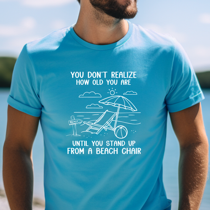Funny beach shirt  You Don’t Realize How Old You Are Standing Up From Beach Chair Bella Canvas soft tee