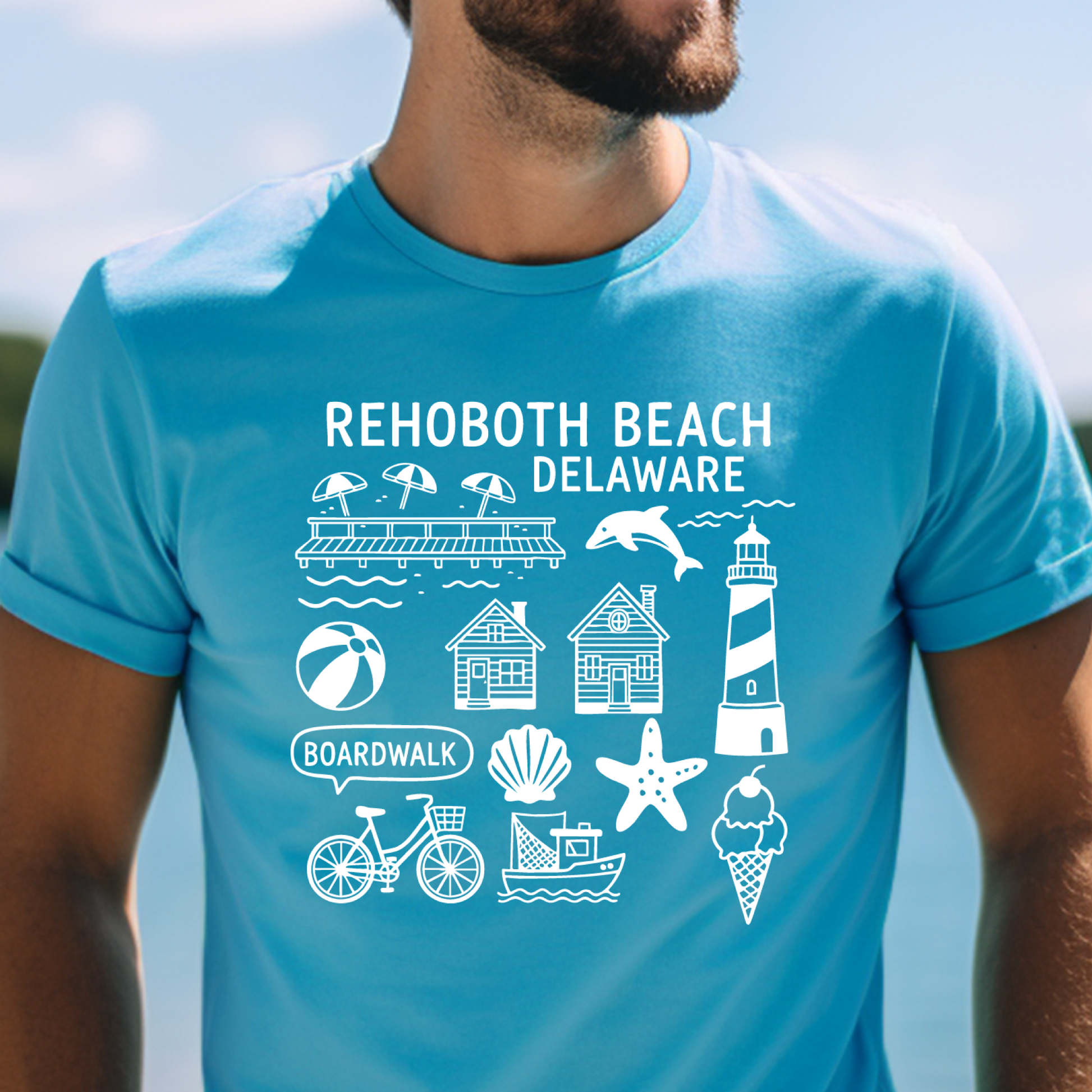 Person wearing a aqua blue t-shirt with Rehoboth Beach, Delaware graphics.