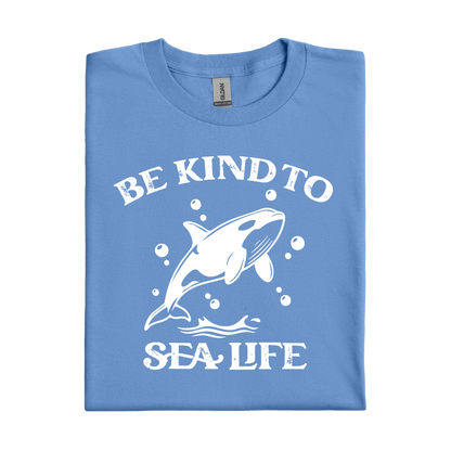 Folded Carolina blue t-shirt with white orca and text design on a white background
