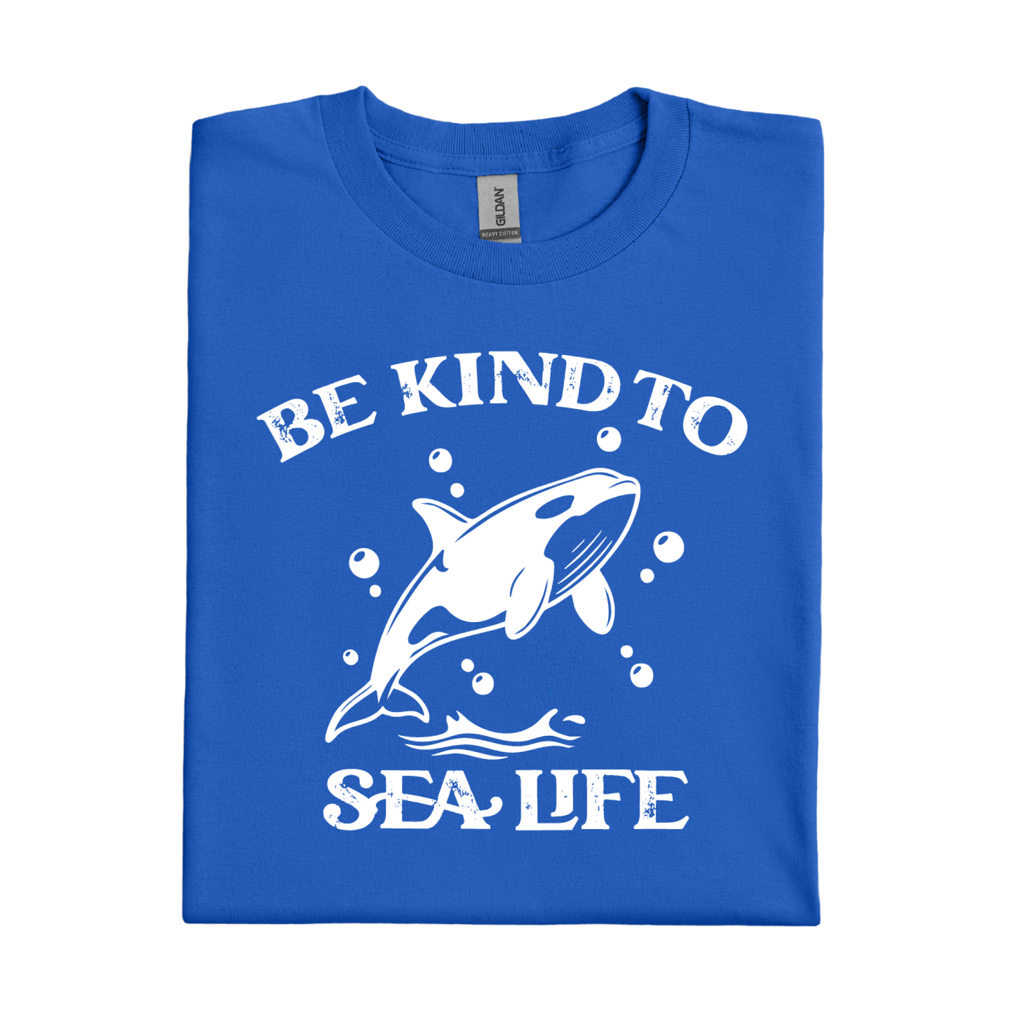 Royal Blue t-shirt with a white whale graphic and text 'Be Kind to Sea Life' on a white background