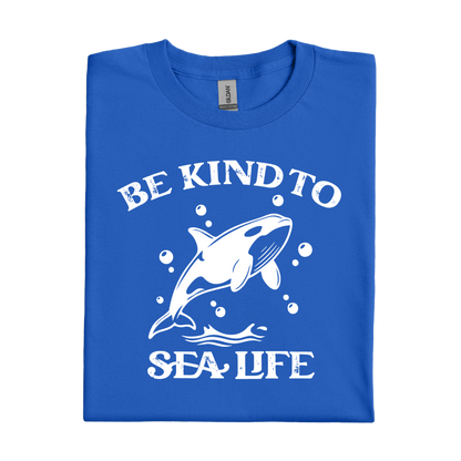 Royal Blue t-shirt with a white whale graphic and text 'Be Kind to Sea Life' on a white background