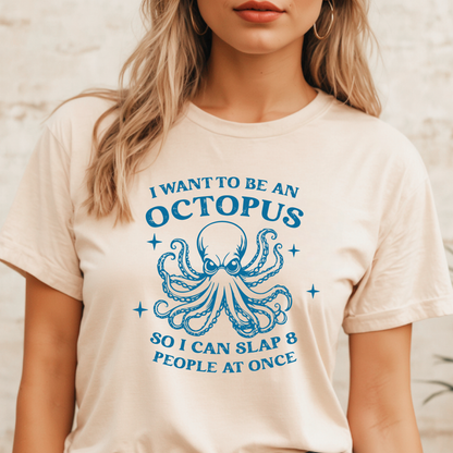 Person wearing a t-shirt with an octopus graphic and text.