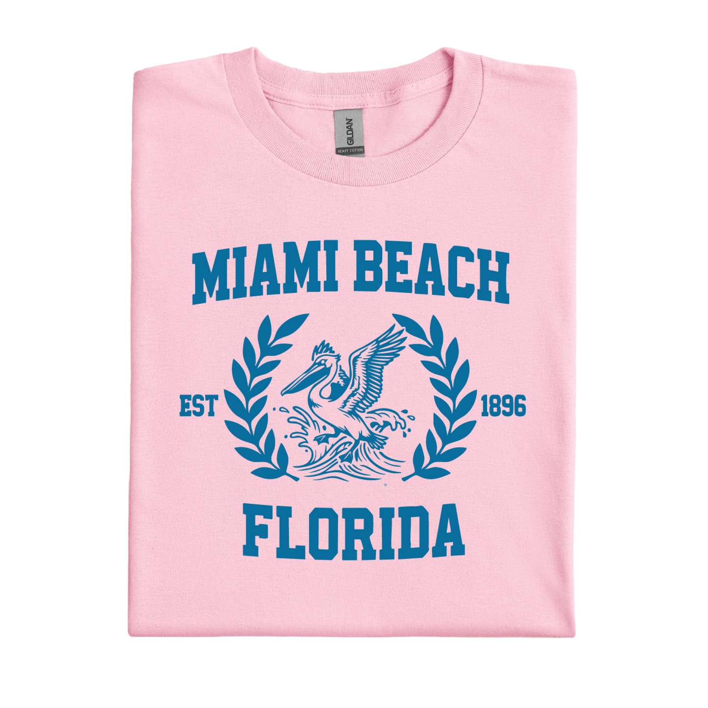 Pink t-shirt with blue 'Miami Beach Florida' design on a white background
