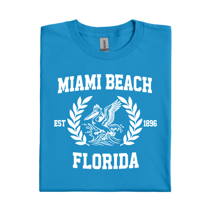 Sapphire Blue t-shirt with 'Miami Beach Florida' text and pelican design on a white background
