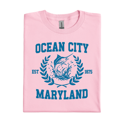 Pink t-shirt with blue 'Ocean City, Maryland' text and graphic on a white background