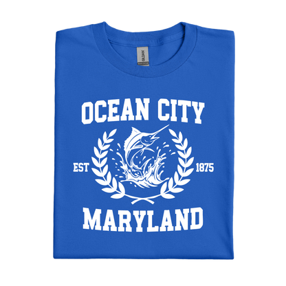 Folded royal blue t-shirt with 'Ocean City, Maryland' text and graphic on a white background
