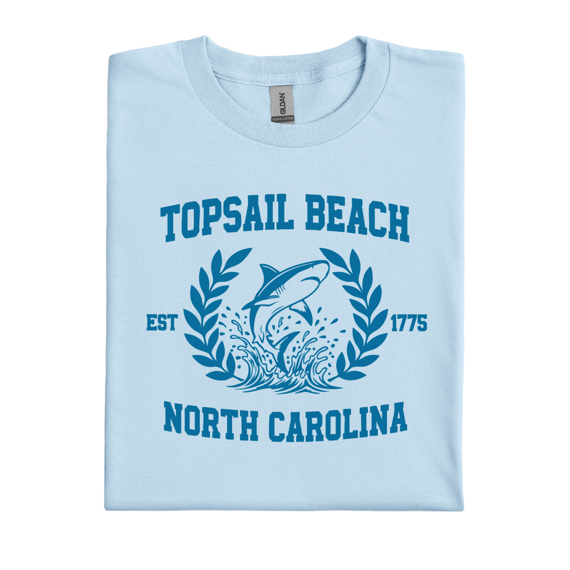 Light blue t-shirt with shark graphic and text on a white background