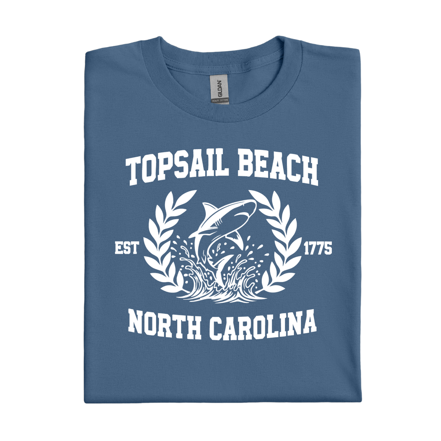 Folded indigo blue t-shirt with Topsail Beach, North Carolina design on a white background