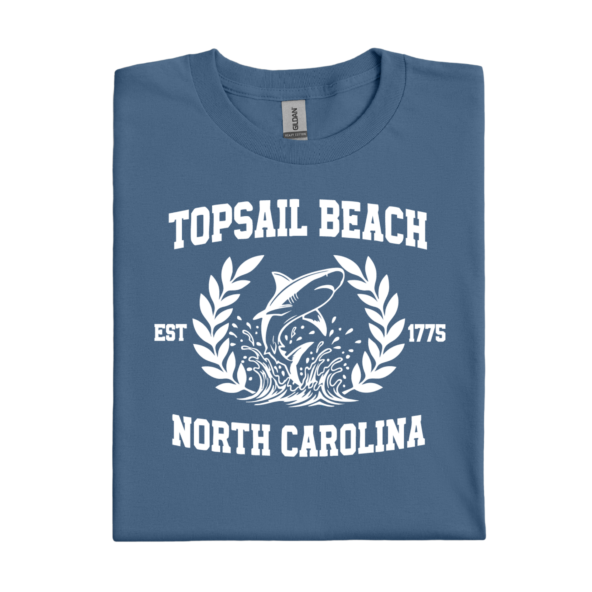 Folded indigo blue t-shirt with Topsail Beach, North Carolina design on a white background