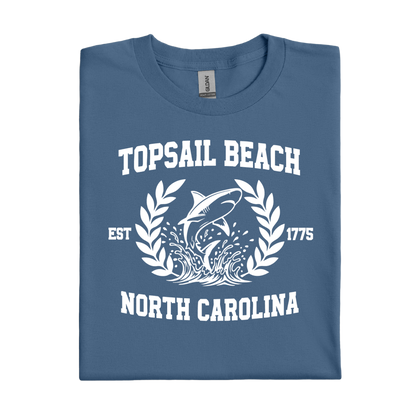 Folded indigo blue t-shirt with Topsail Beach, North Carolina design on a white background