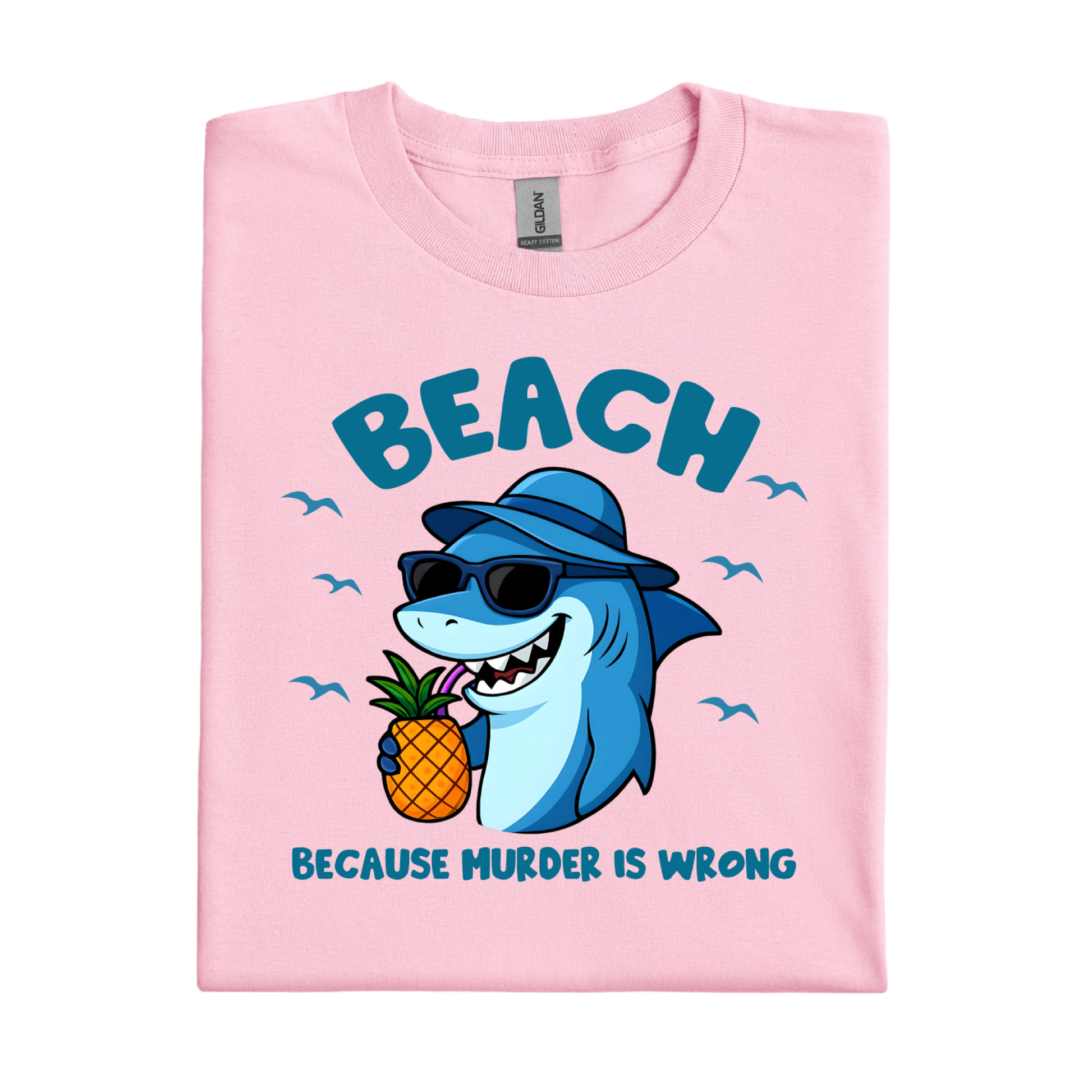 Light Pink t-shirt with a shark holding a pineapple and text on a white background