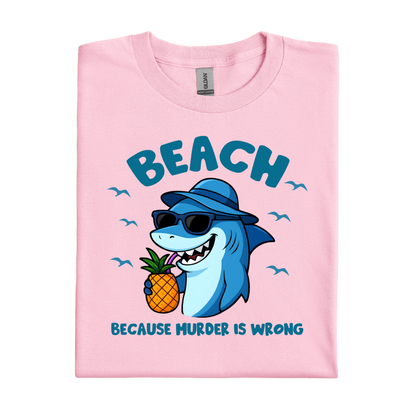 Light Pink t-shirt with a shark holding a pineapple and text on a white background