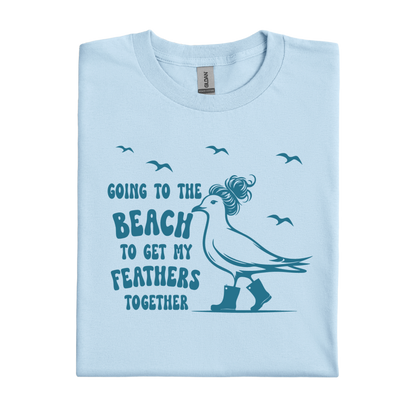 Light blue t-shirt with a seagull graphic and text on a white background