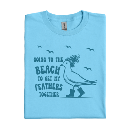 Sky blue t-shirt with a graphic of a bird and text on a white background